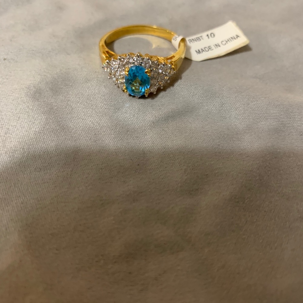 Blue Topaz and Diamond Ring